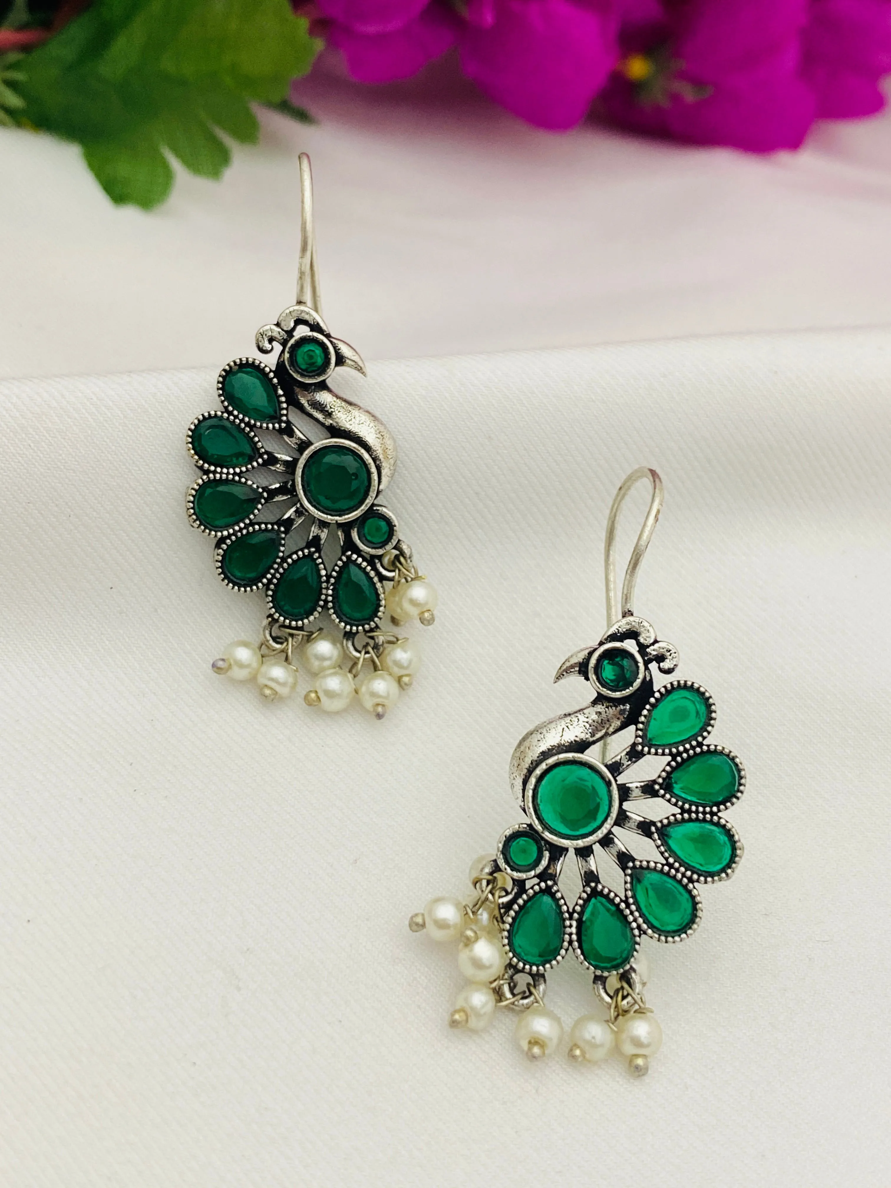 Elegant Emerald Stone Studded Peacock Designed Silver Plated Oxidized Hook Earrings