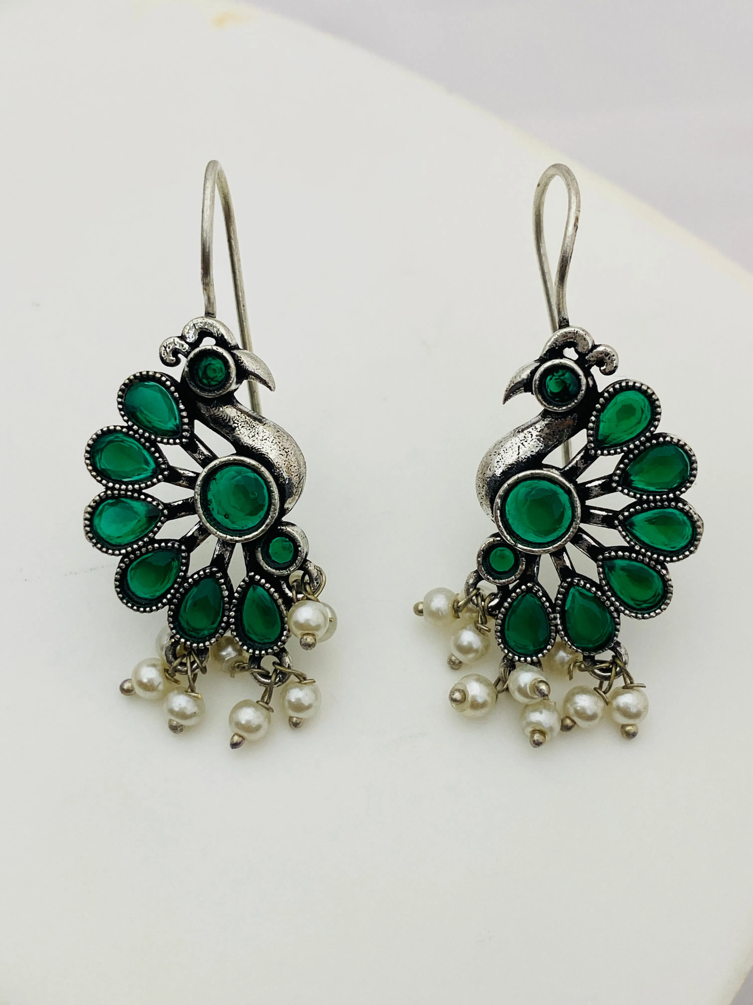 Elegant Emerald Stone Studded Peacock Designed Silver Plated Oxidized Hook Earrings